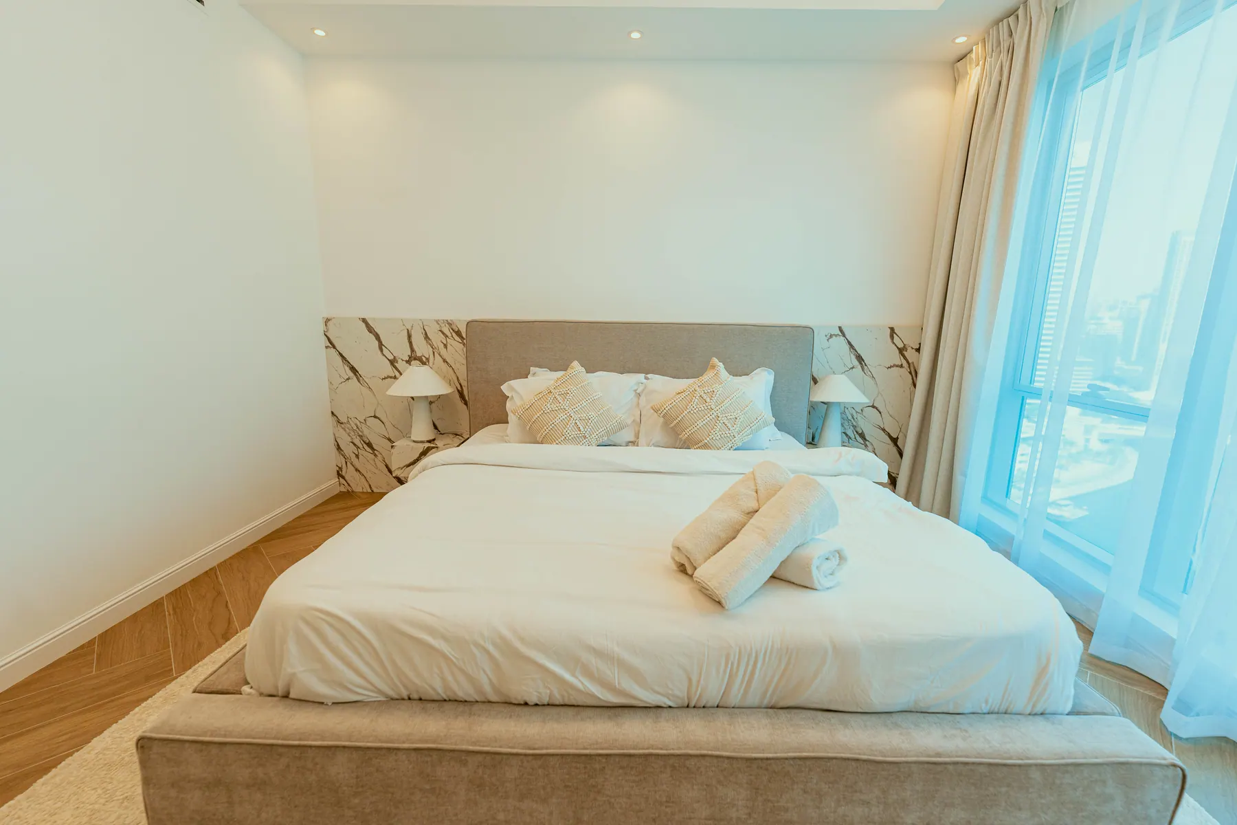 Bedroom with a marina view