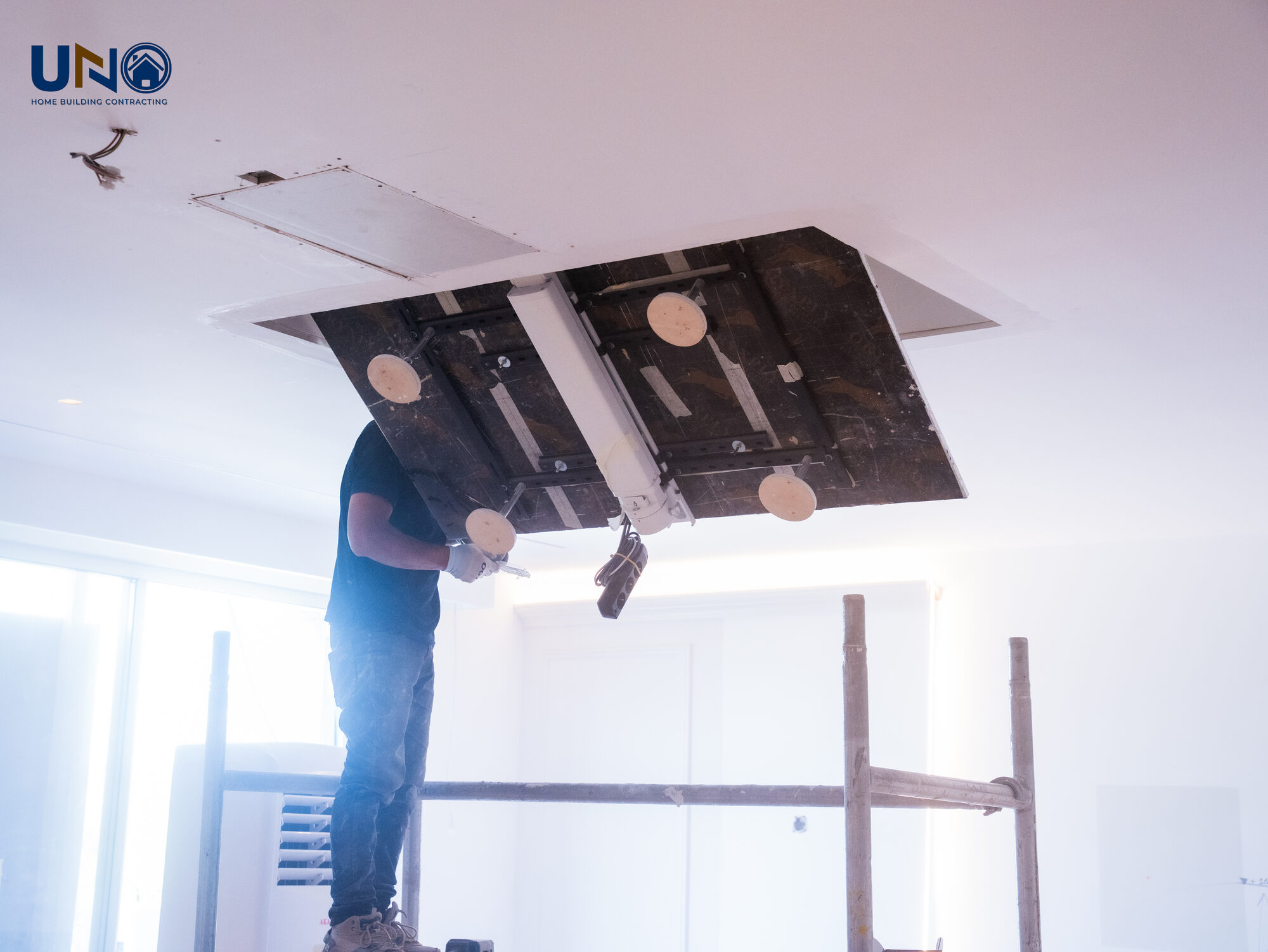 Installing ceiling and MEP first fix on site
