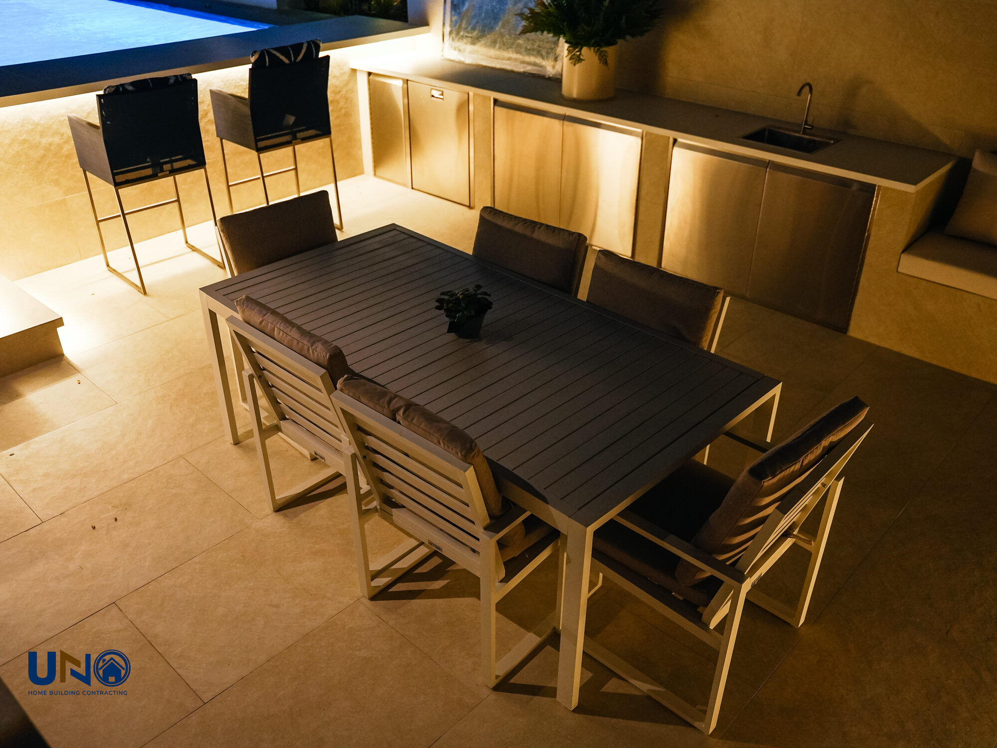 Outdoor dining terrace at night