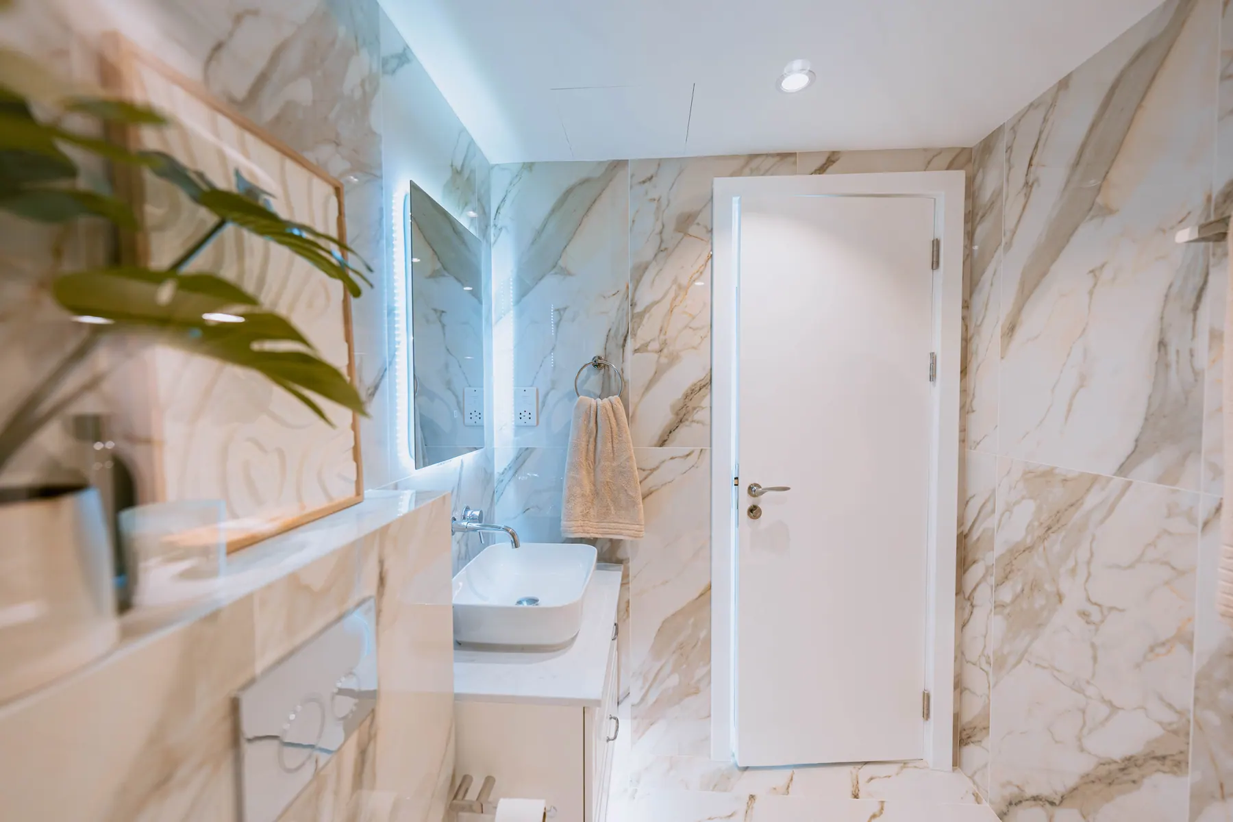 Bathroom in book-matched marble