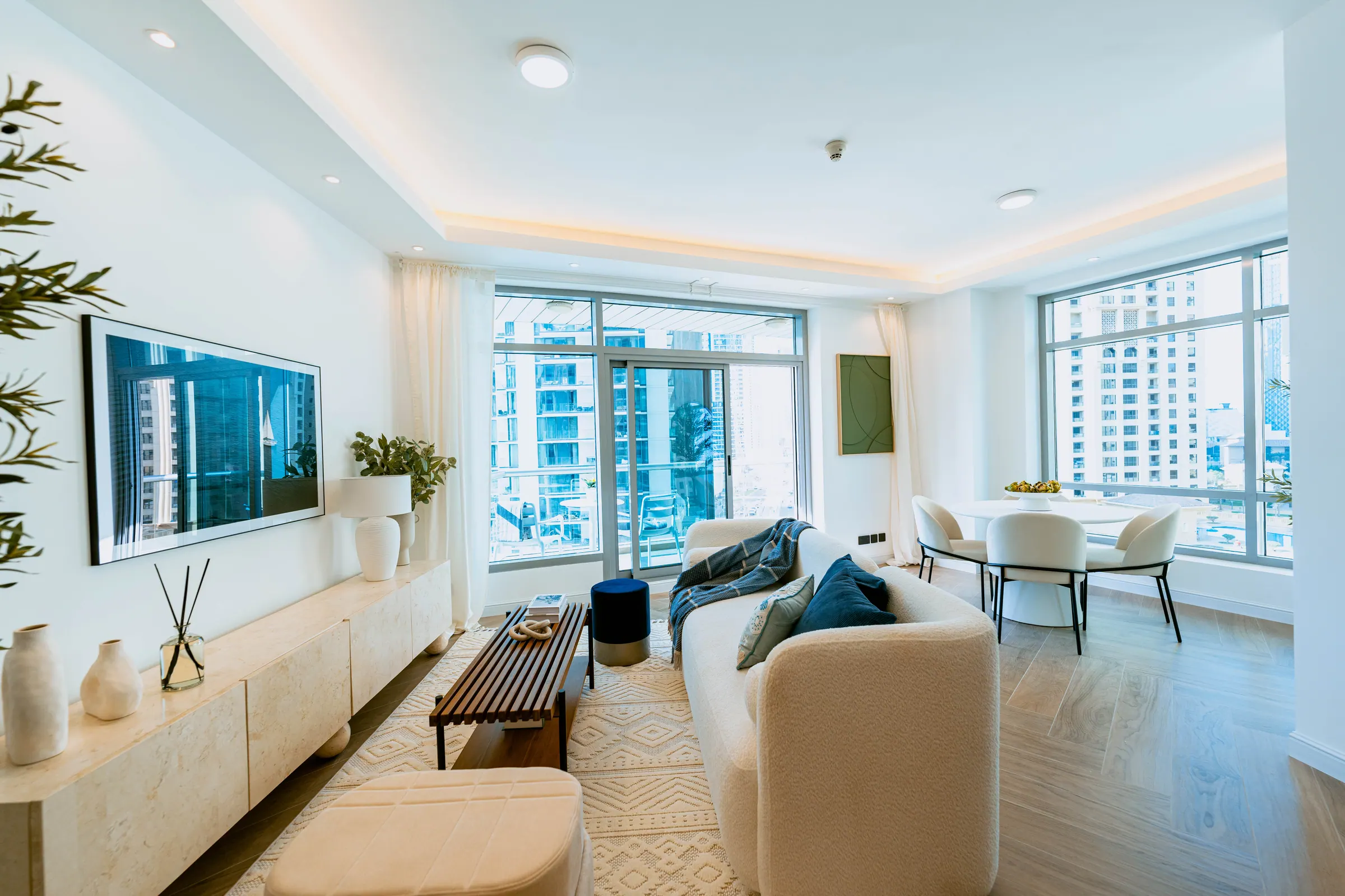 Park Island apartment living and dining space with marina views