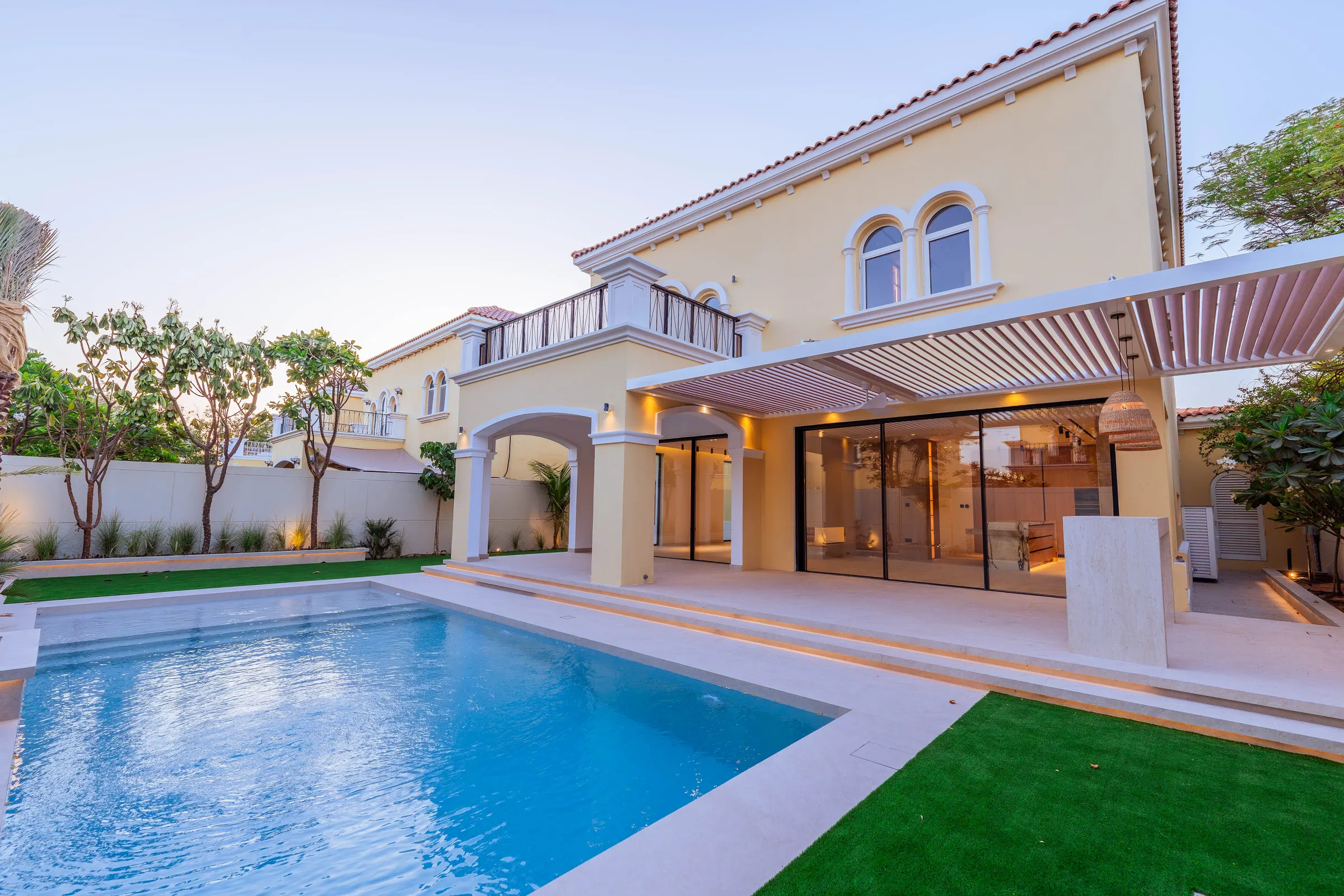 Jumeirah Park villa exterior with the new pool and shaded terrace